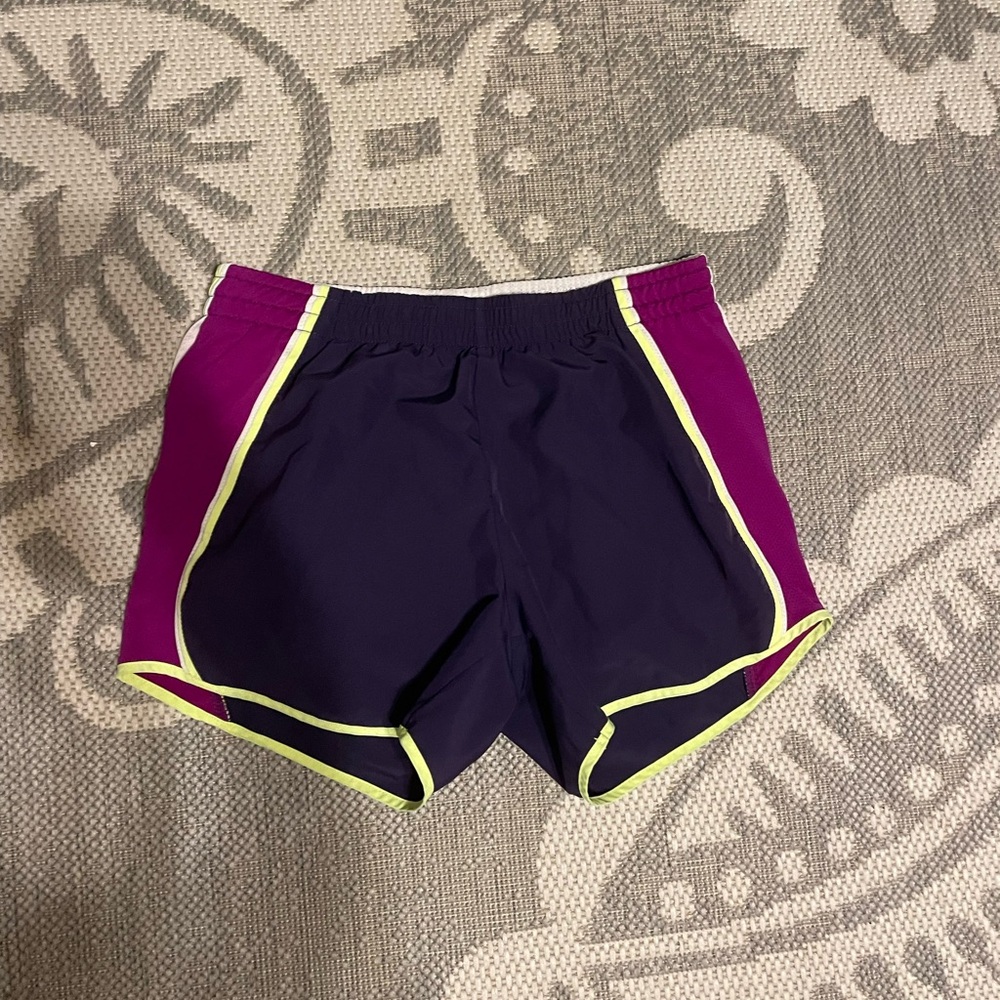 Nike women’s XS purple, green, magenta running shorts
